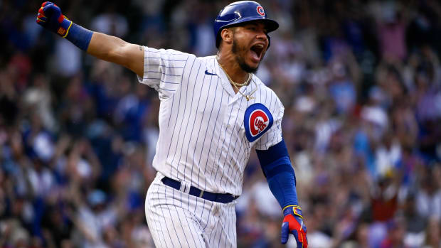 Former Cubs catcher Willson Contreras reacts after hitting a walk-off single.